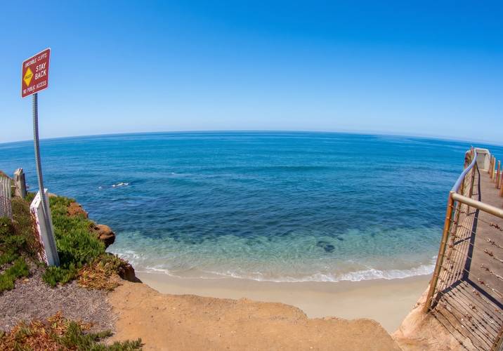 Pescedero surf break in Sunset Cliffs, San Diego — surf breaking below the cliffs.